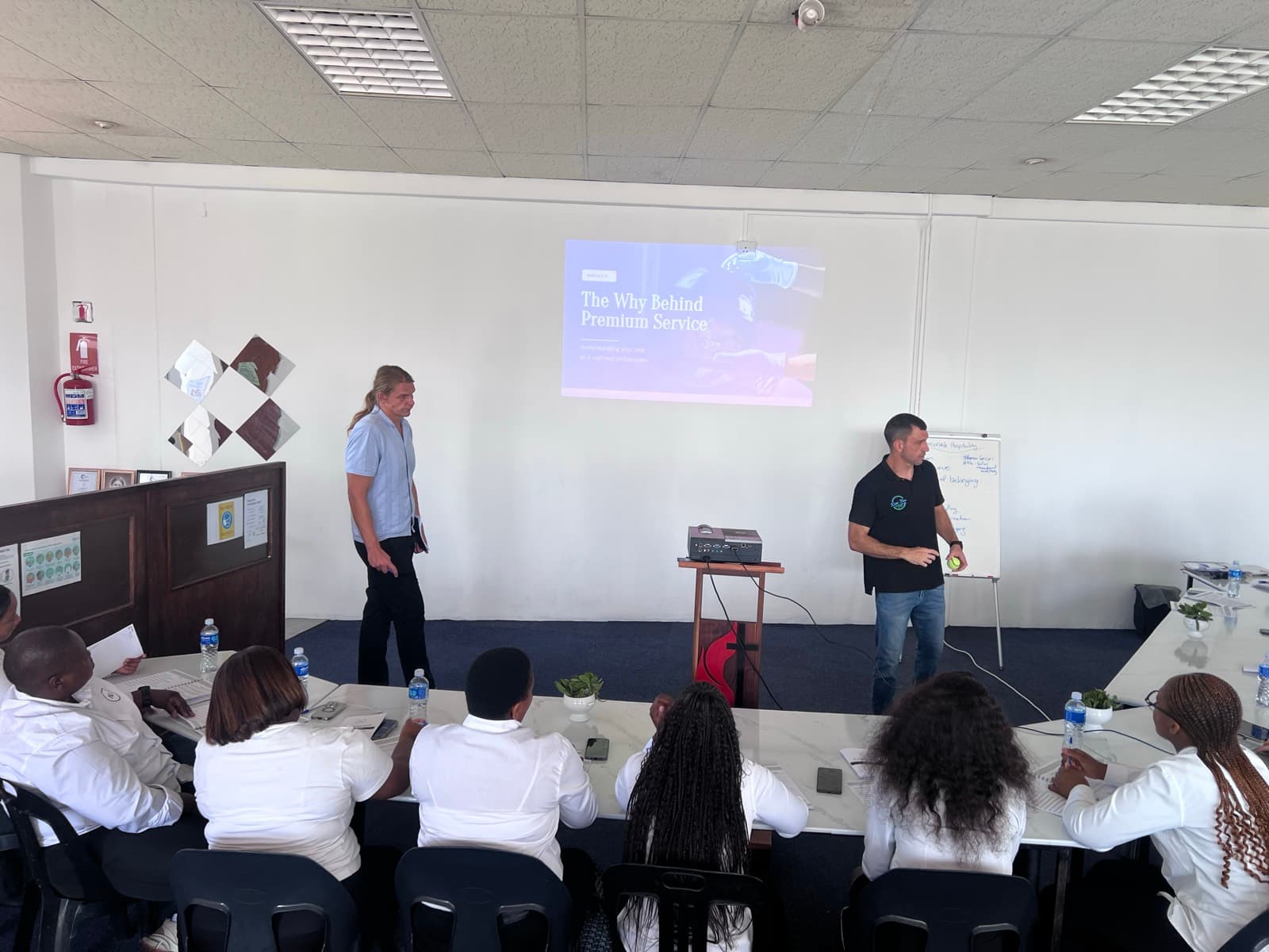 Wide view of a HirePro session assessing a hospitality team's standards on site